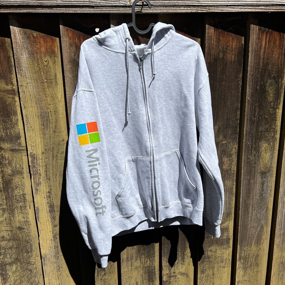 Microsoft zip up sweater.